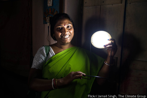 Woman holding solar lamp