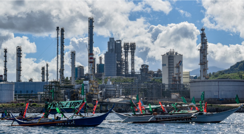 Fishermen hold a Fluvial Protest in Front of Ilijan Power Plant on Earth Day in 2022, Source: CEED